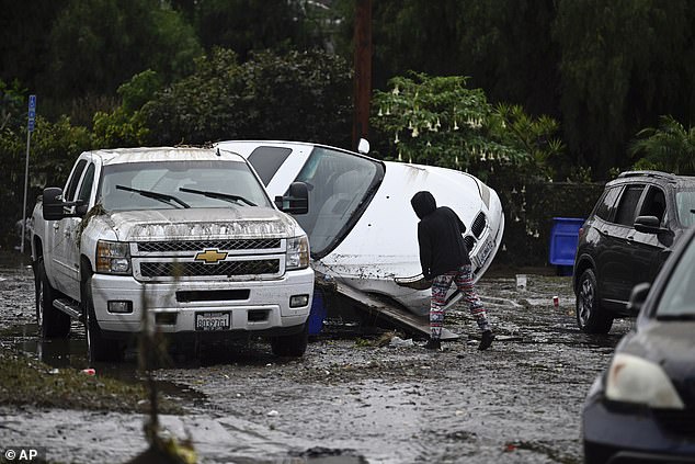 Other residents escaped by wading through waist-high water with their cats and dogs