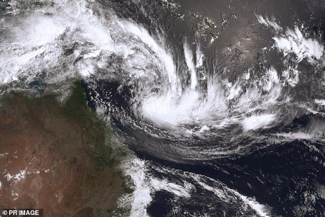 Millions of Australians have been told to brace for impact as Cyclone Kirrilly barrels towards Queensland (radar map pictured), dumping up to a meter of rain in some areas