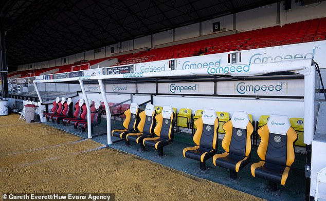 Manchester United's substitutes and coaching staff will watch from here (photo: yellow seats)