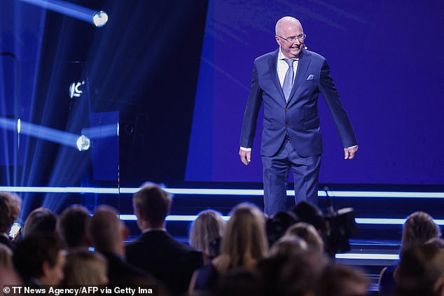 He stepped onto the stage to thank people for their well wishes before presenting the top prizes