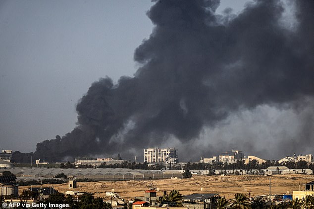 Smoke rises over Khan Yunis in the southern Gaza Strip during the Israeli bombardment, January 22, 2024