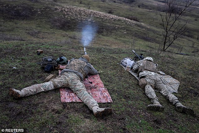 Ukrainian Army snipers practice shooting at a shooting range near a front line, amid the Russian attack on Ukraine, in the Donetsk region, Ukraine, December 23, 2023