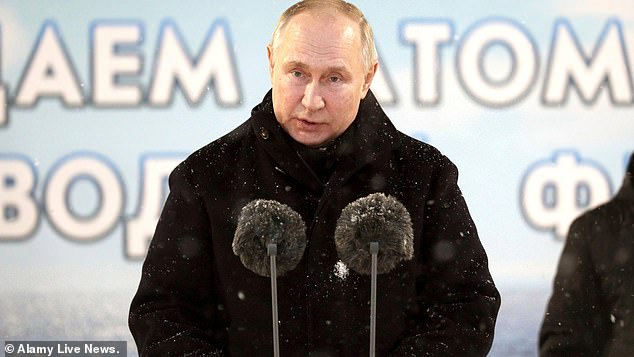 Russian President Vladimir Putin makes remarks during a flag-raising ceremony for the Russian Navy's Borei-class nuclear-powered ballistic missile submarines at the Sevmash shipyard, December 12, 2023 in Severodvinsk, Arkhangelsk Region, Russia