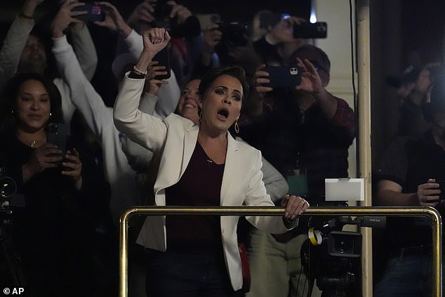 Lake has been campaigning for Trump for the past month, spending time in Iowa and New Hampshire encouraging supporters to vote.  She is seen here on Sunday at a rally in Rochester, New Hampshire