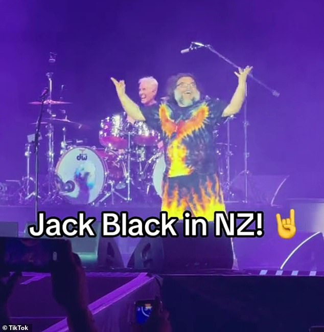 With a big, bushy gray beard and long dark locks, Jack was all smiles as he rocked out next to the Foo Fighters again, as he once did with his band Tenacious D.