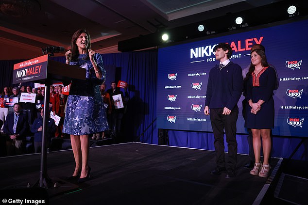 Haley concedes the New Hampshire primary to Donald Trump as her children Nalin, 22, and Rena, 26, stand by on stage