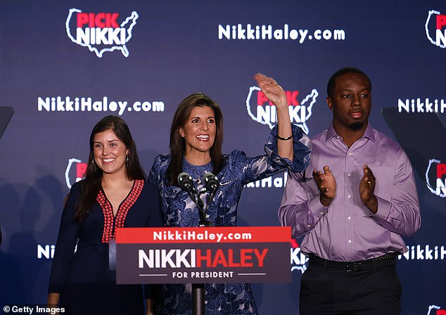 Haley's daughter Rena and her husband Joshua stand with the 2024 hopefuls at her election rally in Concord, New Hampshire on Tuesday, January 23