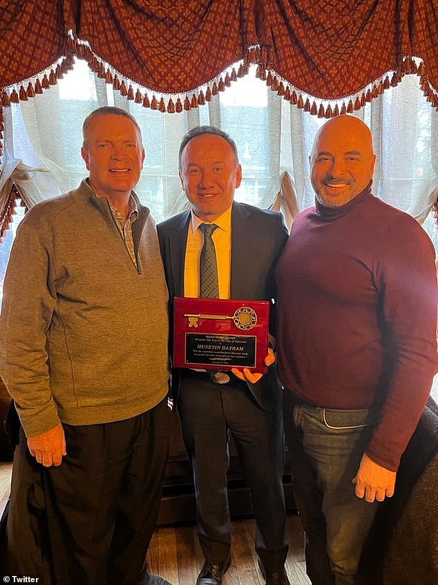 Just before he shot himself, Berdnik posed for a smiling photo with one of the Turkish restaurant's owners.  The owner had been given the keys to the city of Paterson, New Jersey earlier that day for his efforts during the pandemic