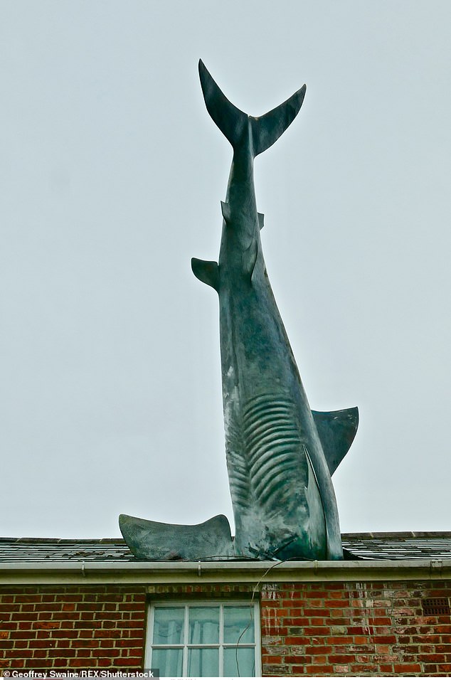 The shark, made of fiberglass and steel, was built by sculptor John Buckley and built in 1986