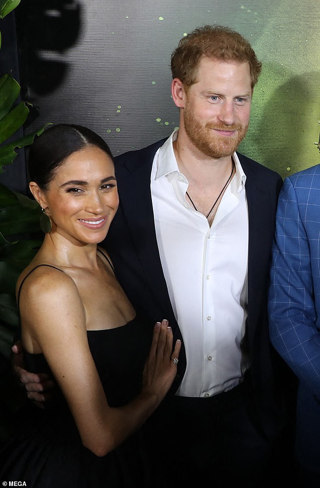 The strappy design showed off her toned shoulders and cinched waist, as the mother-of-two grinned for the cameras at Paramount's glitzy screening of the biopic at the Carib Theater