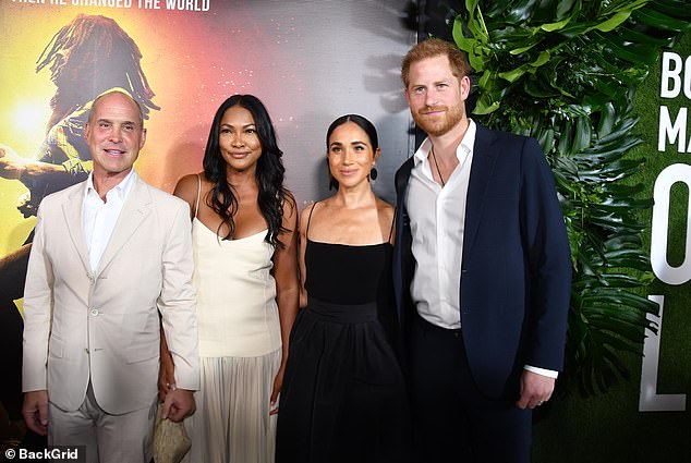 The couple posed with Paramount Pictures and Nickelodeon president and CEO Brian Robbins (left) and his wife Tracy James (second from left)