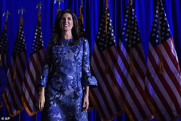 Republican presidential candidate, former UN Ambassador Nikki Haley, walks on stage to address supporters during an evening rally at the New Hampshire Primary in Concord, New Hampshire