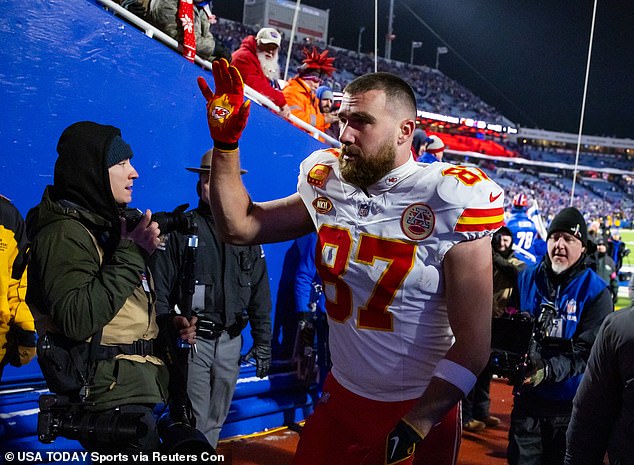 Travis Kelce celebrates as he leaves the field after beating the Buffalo Bills in Orchard Park