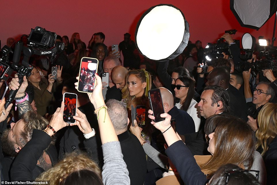 Jennifer pulled out dozens of cameras as she walked inside