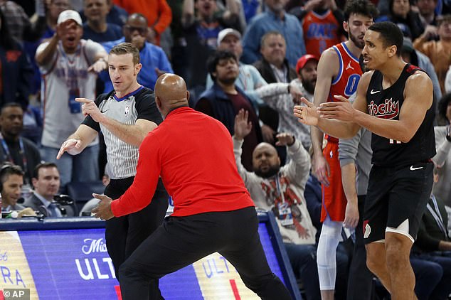 But furious Portland coach Chauncey Billups claimed he tried to call a timeout when Malcolm Brogdon (right) was penalized beforehand for a double dribble.