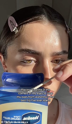 A video posted by @danicolexx (pictured), who has 467,000 followers, shows her dipping a cotton swab in Vaseline and placing it in the corner of her eye during her makeup routine