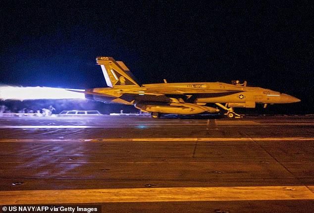 A fighter jet takes off from the USS Dwight D Eisenhower on January 12 as the US conducts airstrikes on Houthi targets