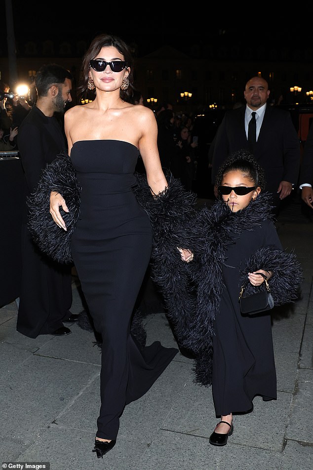 Stormi stole the spotlight, wearing black-rimmed sunglasses and donning a stunning black dress to complement Kylie