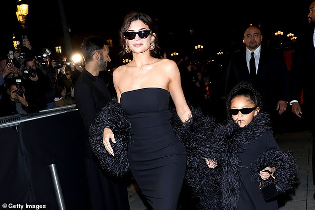 The mother-of-two couldn't wipe the smile off her face as she proudly walked with her daughter