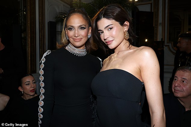 Inside the show, Kylie stopped for photos with icon Jennifer Lopez, who had an elegant figure