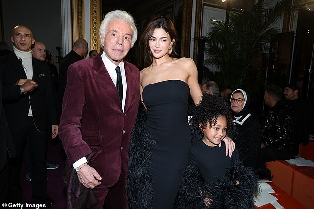 Kylie and Stormi beamed at the show for a photo with Giancarlo Giammetti, the president of Valentino