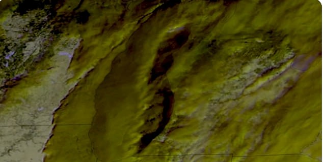 Only a few square miles near the Great Lakes were hit by the snowstorm, but the near-white impact of that Arctic explosion flooded roads and paralyzed traffic