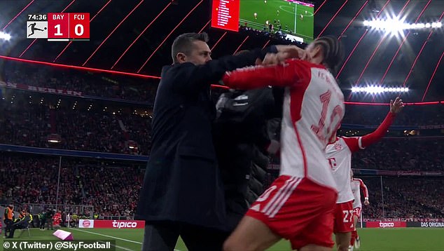 The Union Berlin boss lost his cool as he faced Sane before shoving him in the face