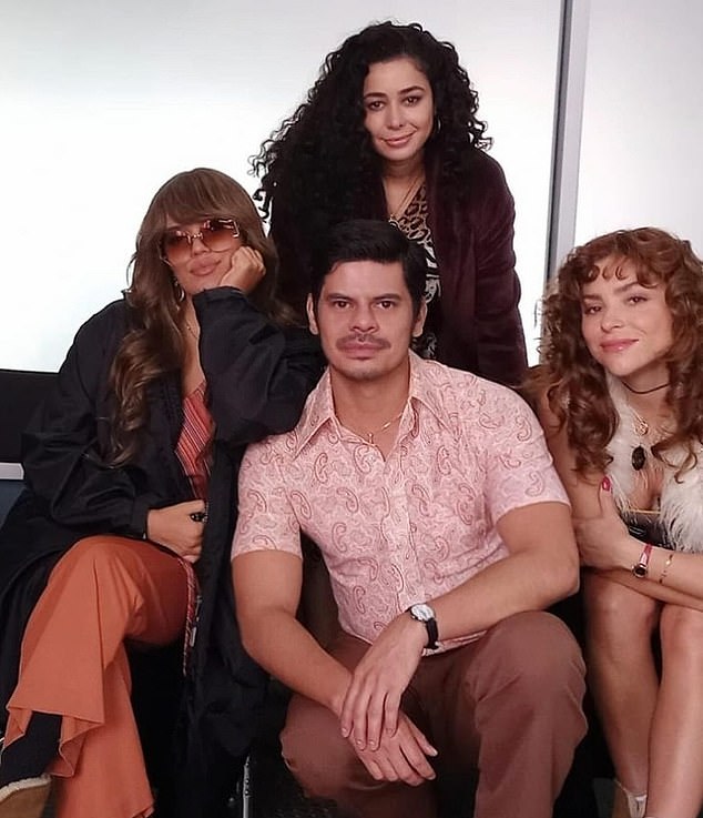 Aurora Cossio (center) pictured with her Griselda co-stars Fredy, Karol G and Paulina Davila (right)