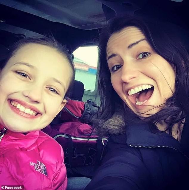 Holland's four daughters from a previous relationship were reportedly afraid of Daus and witnessed numerous violent scenes between him and their mother.  Holland is pictured with her daughter Emma