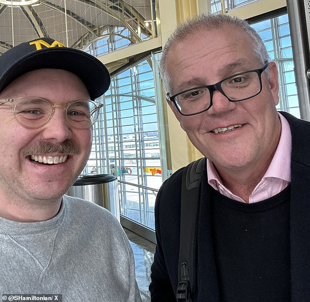 Economist Steven Hamilton (pictured with former Prime Minister Scott Morrison) was a supporter of the previous stage three tax cuts but has now endorsed Labor's revised version