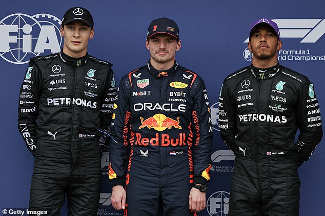 Max Verstappen (pictured, center) won a chaotic race that had to be restarted a record three times after a series of red flags