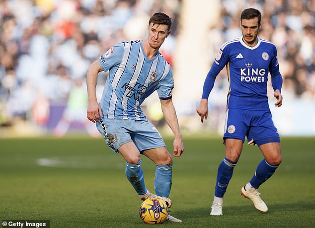 Luton Town could expand their ranks with the recruitment of Ben Sheaf (pictured centre)