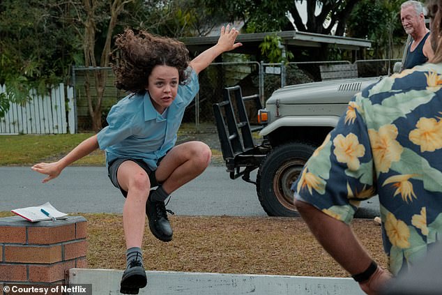 Adapted from Trent Dalton's bestseller of the same name, the drama is set in 1980s Brisbane and follows the life of young Eli Bell as he deals with bullies, trauma and crime.  Pictured: A scene from the Boy Swallows universe