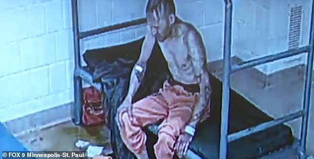 Bellamy is seen on his bed in prison, in agony.  He died of a perforated intestine