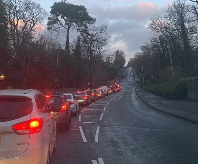 Huge traffic jams stretch along the road outside the author's home as construction blocks the roads