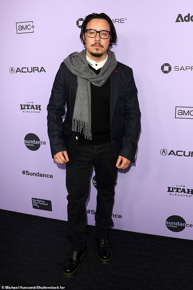 Ramirez opted for a black denim jacket over a black sweater and white shirt with black framed glasses