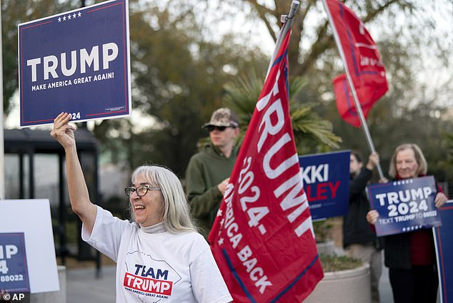 Haley's latest campaign stop was greeted by Trump supporters waving flags and signs outside her rally on Wednesday evening