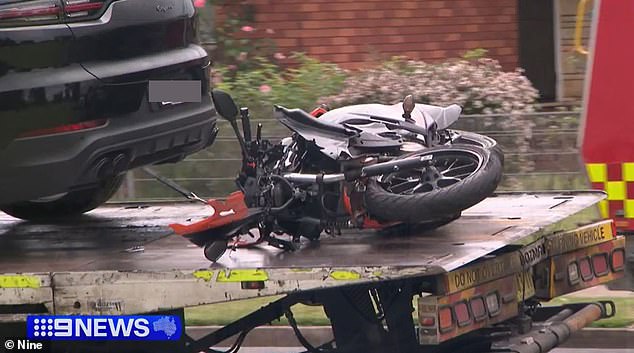 The motorcycle he was riding is pictured after the fatal crash