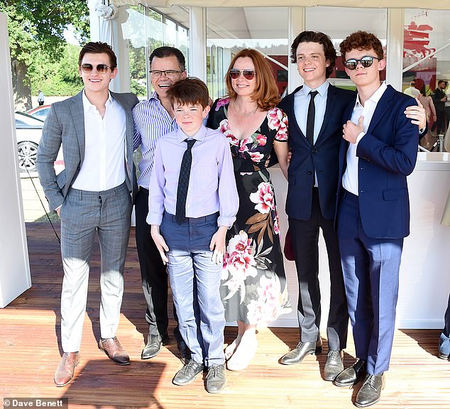 Tom, 27, with his parents Dominic and Nicola and siblings Paddy, 19, and Sam and Harry, 24, at Ascot in 2018