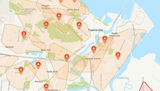 A map shows about 50 separate areas of Townsville without power, including much of the CBD