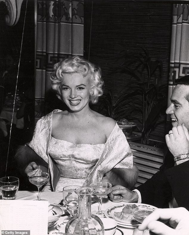 A better title would have been: I Didn't Really Have Lunch with Marilyn (pictured in a restaurant in the 1950s)