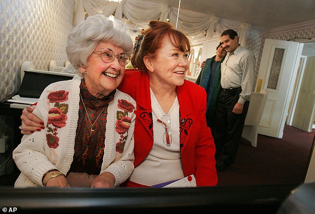 Charolette Richards, right, and part-time organist Rhoda Jones at the Little White Wedding Chapel in Las Vegas in 2006