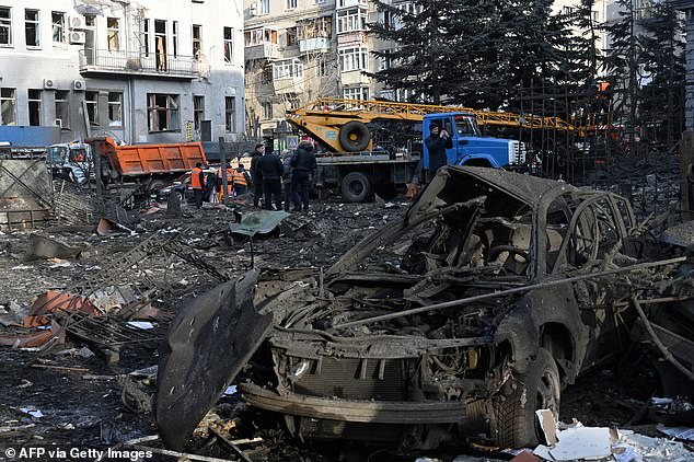 The wreckage of a burnt-out car seen on the streets of Kharkiv in eastern Ukraine after a Russian missile attack