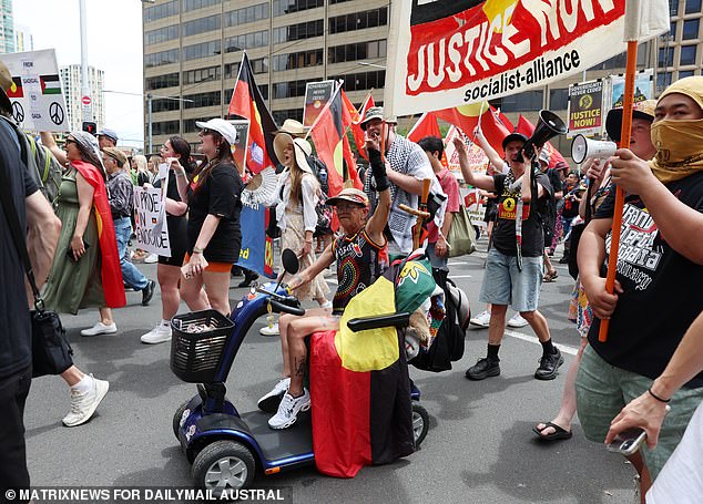 Men and women sang passionately as they walked through the streets