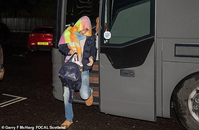 The soap star looked sheepish as he stepped off the tour bus first, with a giggling Ellie following close behind