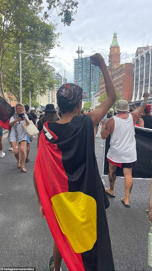 Some protesters wore Aboriginal flags over their shoulders like capes