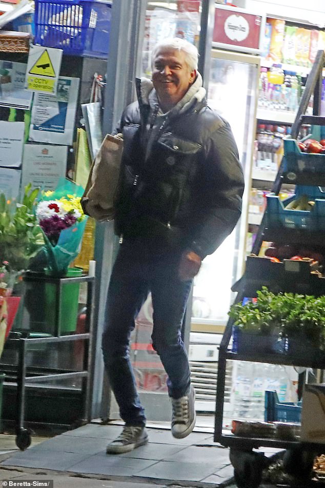 The star was dressed casually in jeans and Converse paired with a padded jacket as he left the local store