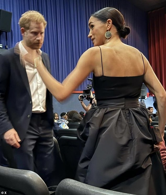 While Meghan (pictured, right) seemed reasonably cheerful, her husband Harry (pictured, left) seemed more downcast