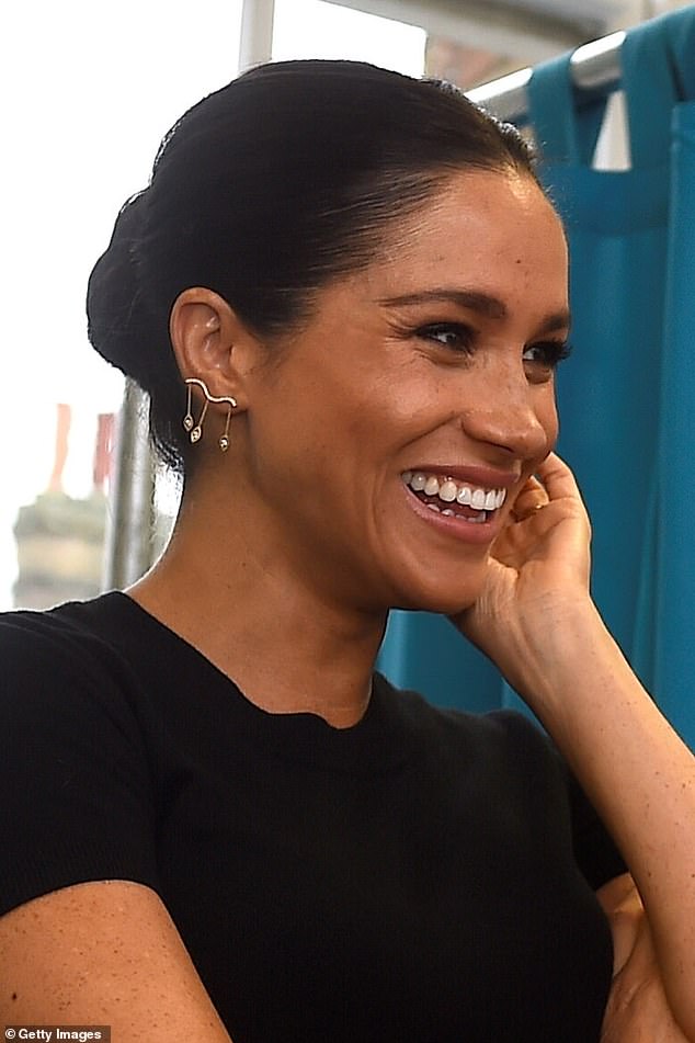 Meghan Markle wears a pair of Kimaï lab-grown diamond earrings while visiting Smart Works in the city in January 2019