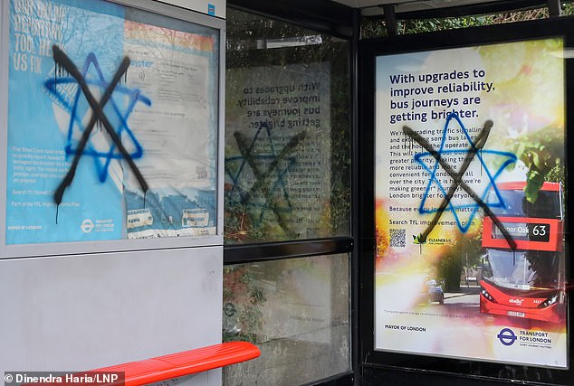 Photos taken in December showed a bus stop in Stamford Hill covered in graffiti showing a Star of David with a cross spray-painted on it